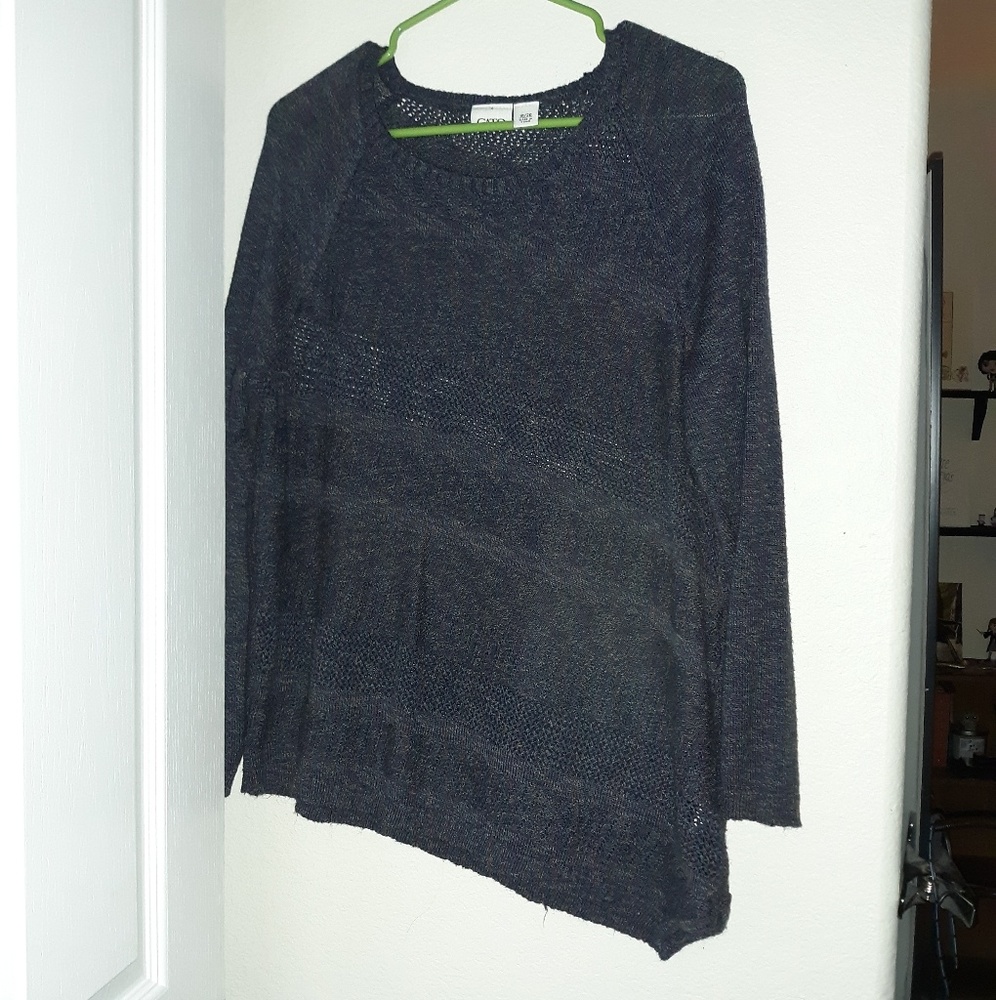 Asymmetrical sweater with diagonal stripes